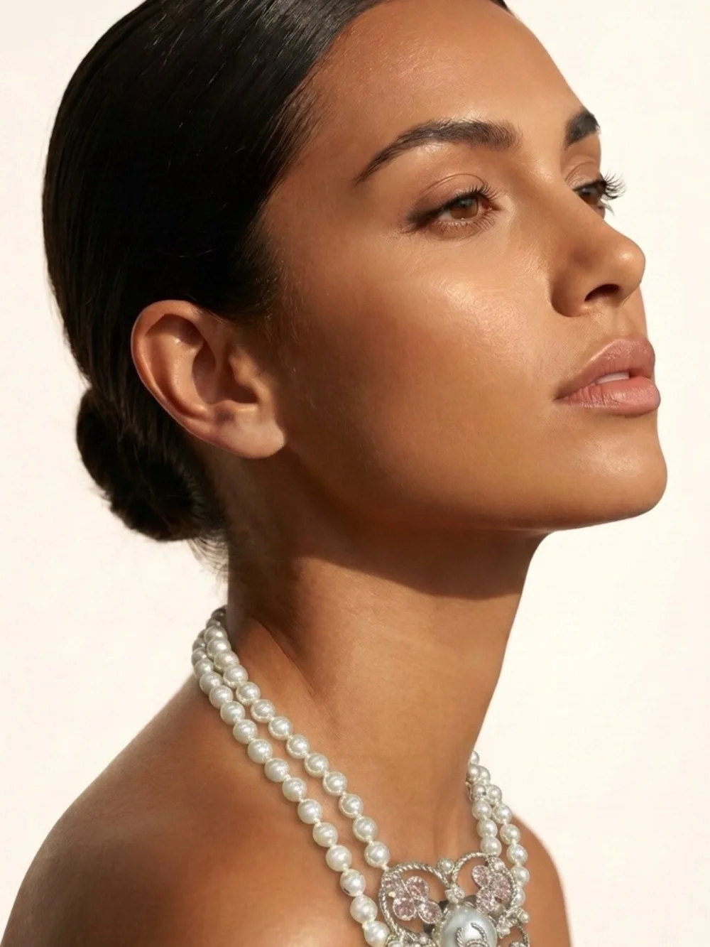 CHANEL Elegant White Pearl Double Strand Necklace with Decorative Pendant
